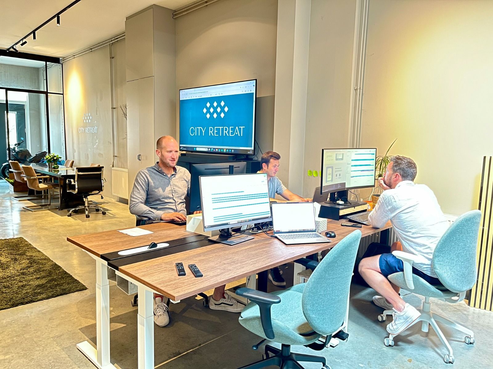 City Retreat team working at the office